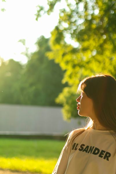 a woman standing in a park